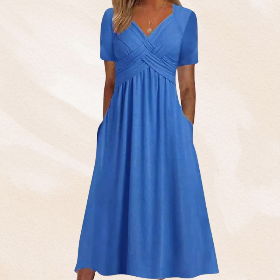 Alina Damen Midikleid in Blau mit V-Ausschnitt, kurzen Ärmeln und praktischen Seitentaschen.