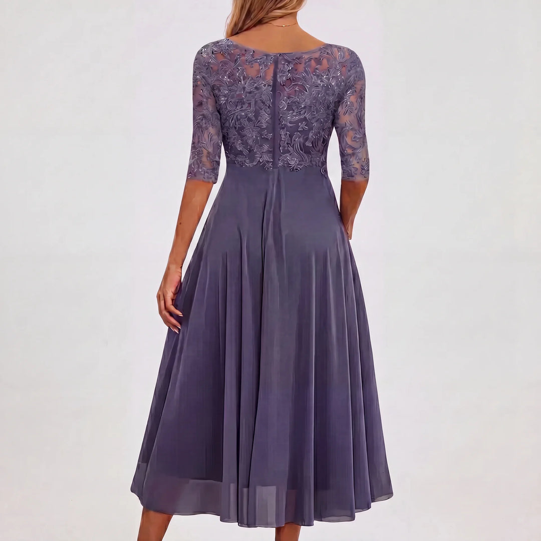 Elegantes Amelie Damen Midikleid in Grau mit feiner Spitzenoptik, halbtransparenten 3/4-Ärmeln und fließendem Rock.