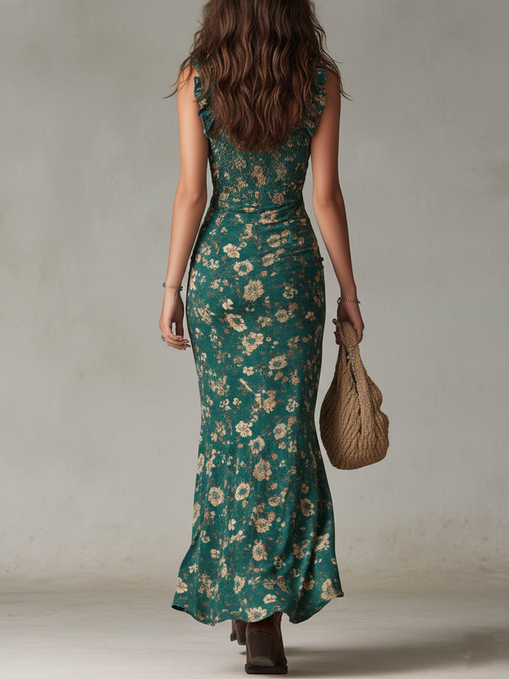 Grünes Anja Boho-Maxikleid mit floralem Muster von hinten gezeigt