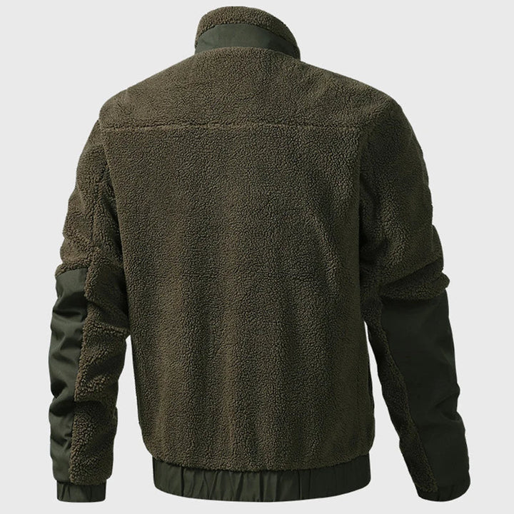 Dunkelgrüne Dario Herren-Fleecejacke mit Stehkragen, kuscheligem Teddy-Fleece und robusten Kontrast-Einsätzen an Ärmeln.