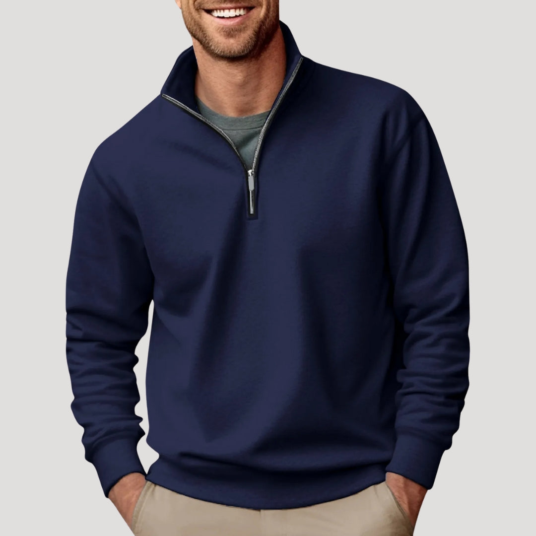 Dunkelblaues Herren-Sweatshirt mit Stehkragen, kurzem Reißverschluss und gerippten Bündchen in lockerer Passform.