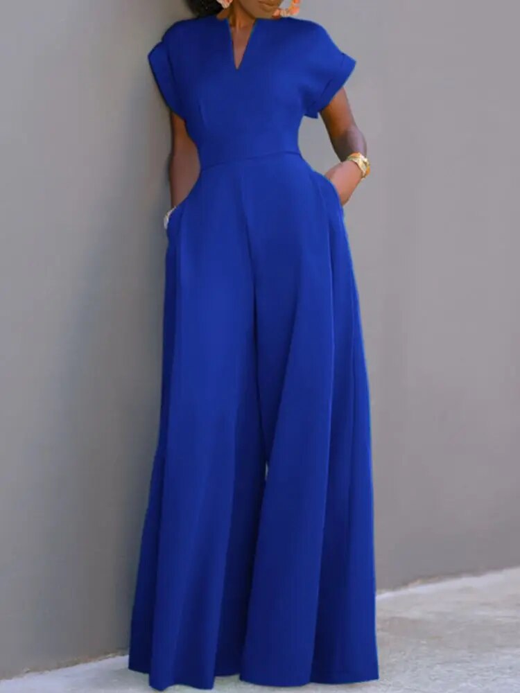 Königsblauer Elena Damen-Jumpsuit mit V-Ausschnitt, betonter Taille und weitem Bein.