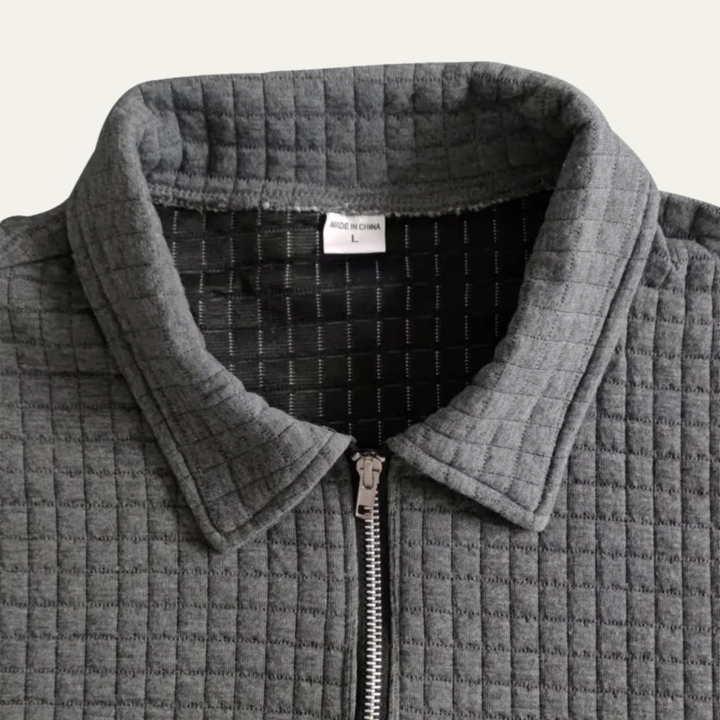 Graues Herren-Poloshirt in Waffelstruktur mit Reißverschluss am Kragen, Größe L, aus dem Elias Set.