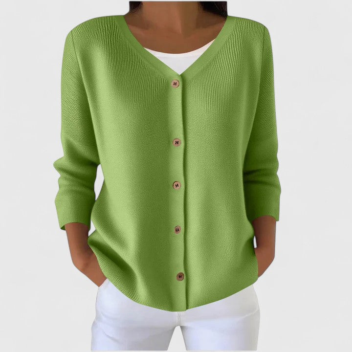 Hellgrüne Damen-Strickjacke mit V-Ausschnitt, durchgehender Knopfleiste und gerippten Details in feiner Strickoptik.