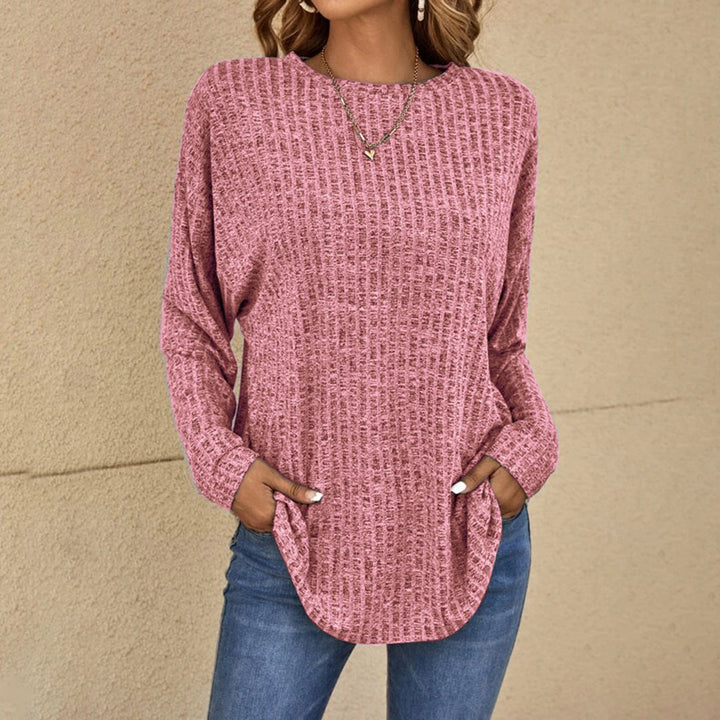 Altrosa Oversized-Pullover aus Waffelstrick mit Rundhals, tief sitzenden Schultern und abgerundetem Saum.
