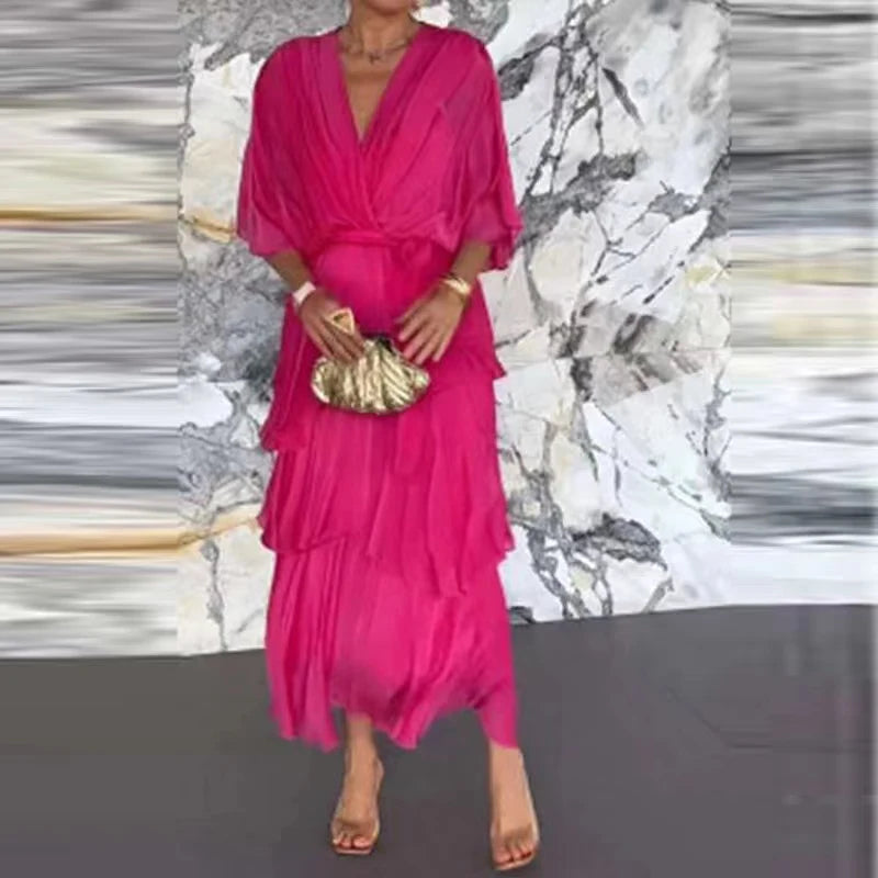 Pinkes Fabienne Wickel-Midikleid mit V-Ausschnitt, Taillenbindung und Stufenrock