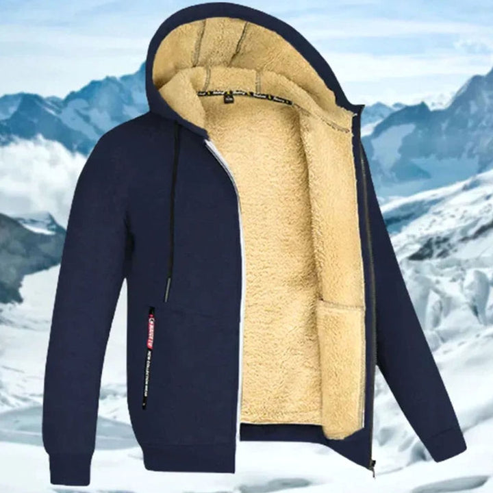 Dunkelblaue Fabio Herren-Kapuzenjacke mit kuscheligem beigefarbenem Fleecefutter und praktischem Reißverschluss.