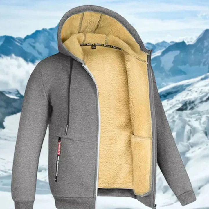 Graue Fabio Kapuzenjacke mit kuscheligem beigen Fleecefutter, durchgehendem Reißverschluss und praktischen Taschen.