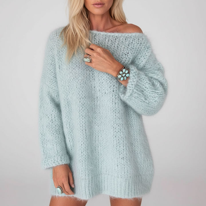 Kuscheliger, hellblauer Oversized-Strickpullover mit weichem Grobstrick und lässigen Umschlag-Bündchen.