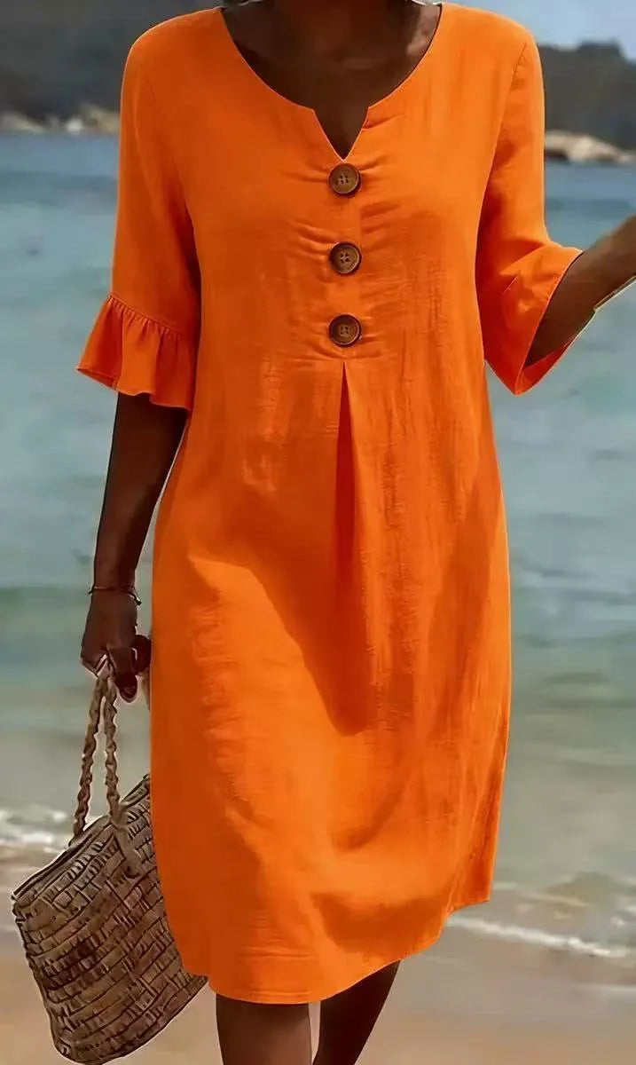 Oranges Fiona Midikleid mit V-Ausschnitt, Volant-Ärmeln und Zierknöpfen am Strand