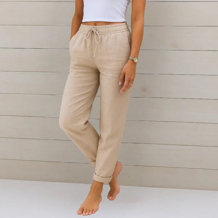 Franka Damen Sommer Leinen Hose in Beige mit hohem Bund, elastischem Bund und lockerem Schnitt.
