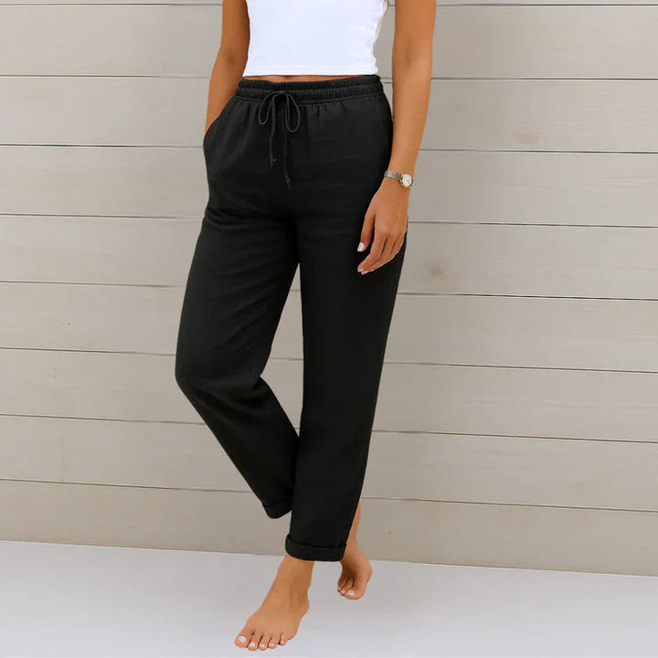 Franka Damen Sommer Leinen Hose in Schwarz: locker geschnitten, hohe Taille, elastischer Bund.