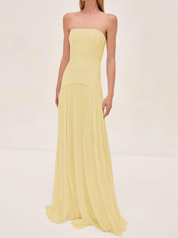 Trägerloses, plissiertes Franziska Maxikleid in Hellgelb mit tailliertem Oberteil.