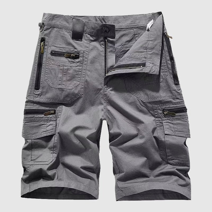 Graue Kilian Cargo-Shorts für Herren mit Reißverschlusstaschen, Knopfverschluss und robustem Baumwollstoff.