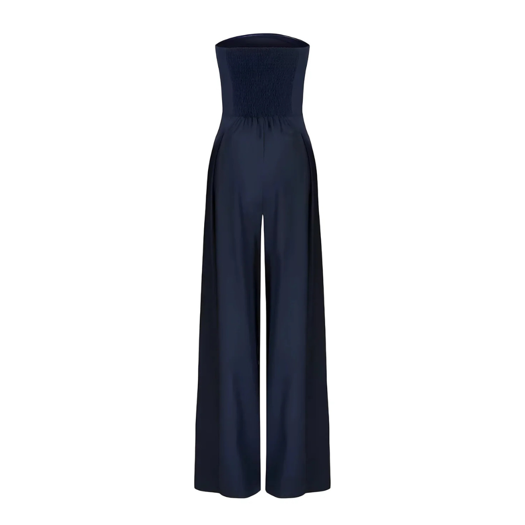 Trägerloser Larissa Jumpsuit in Dunkelblau mit weitem Bein und gerafftem Rückenteil.