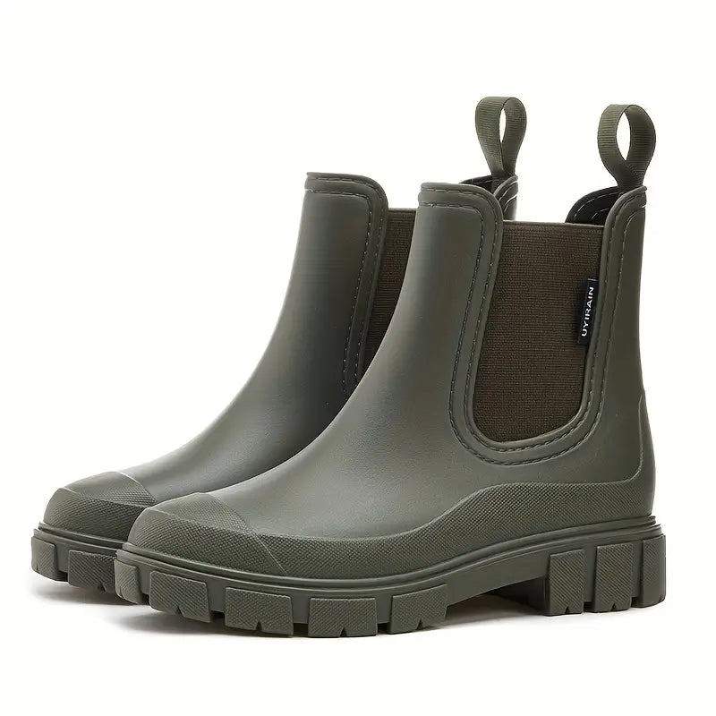 Olivgrüne wasserdichte Damen Chelsea Boots mit elastischen Einsätzen, Zuglaschen und robuster Profilsohle.