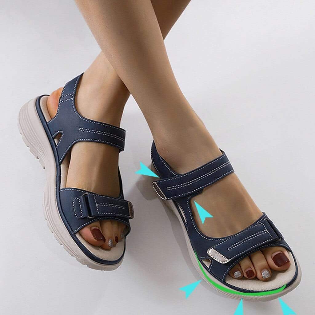 Dunkelblaue Damen-Sandalen mit verstellbaren Klett-Doppelriemen und bequemer, heller Profilsohle für optimalen Halt.