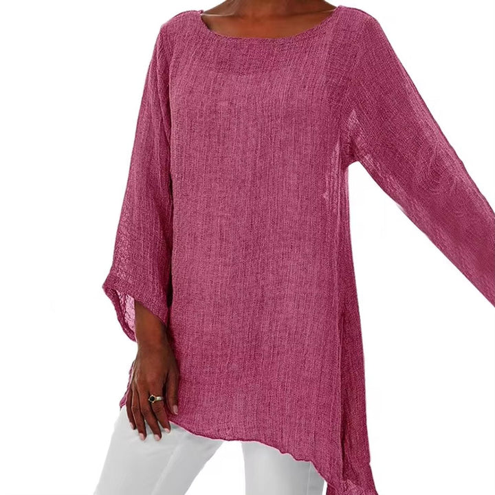 Beerenfarbene Oversized-Tunika aus leichtem Leinenstoff mit Rundhalsausschnitt, langen Ärmeln und asymmetrischem Saum.