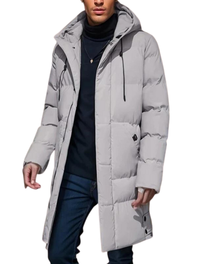 Graue, lange Lukas Pufferjacke für Herren mit Kapuze, gesteppter Wattierung und praktischen Reißverschlusstaschen.