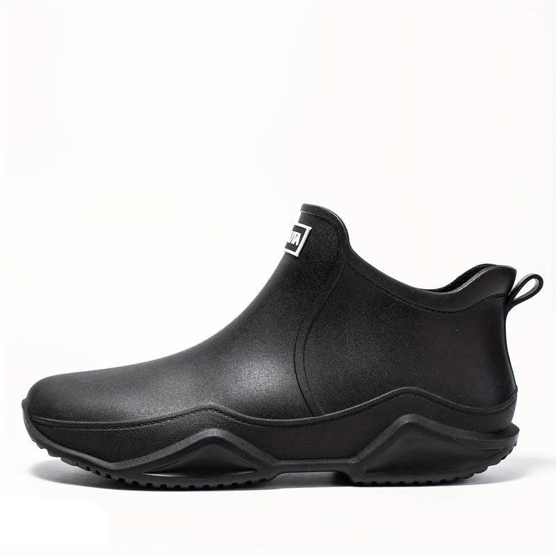Schwarze, wasserdichte Mara Damen-Stiefeletten zum Hineinschlüpfen mit griffiger Wellen-Laufsohle und knöchelhohem Schaft.