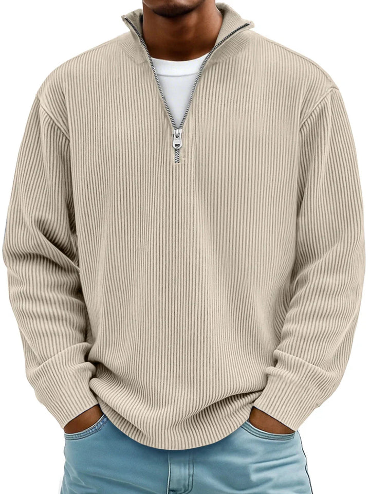Beiger Herren-Pullover mit Half-Zip-Kragen, vertikaler Rippenstruktur und lockerer Passform.