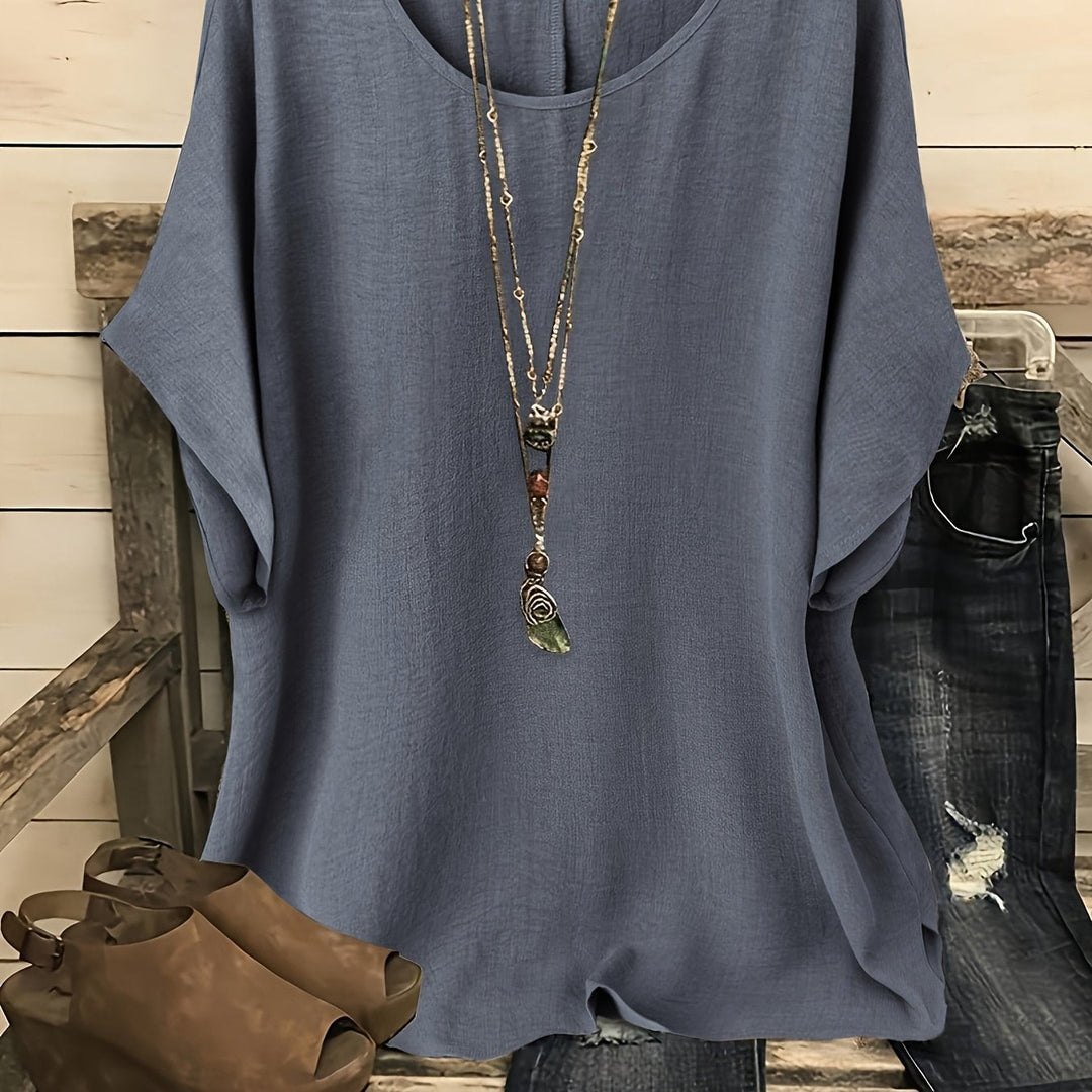 Blaues Marlene Damen-Shirt in Leinen-Optik mit Rundhalsausschnitt, kurzen Ärmeln und lockerer Passform.
