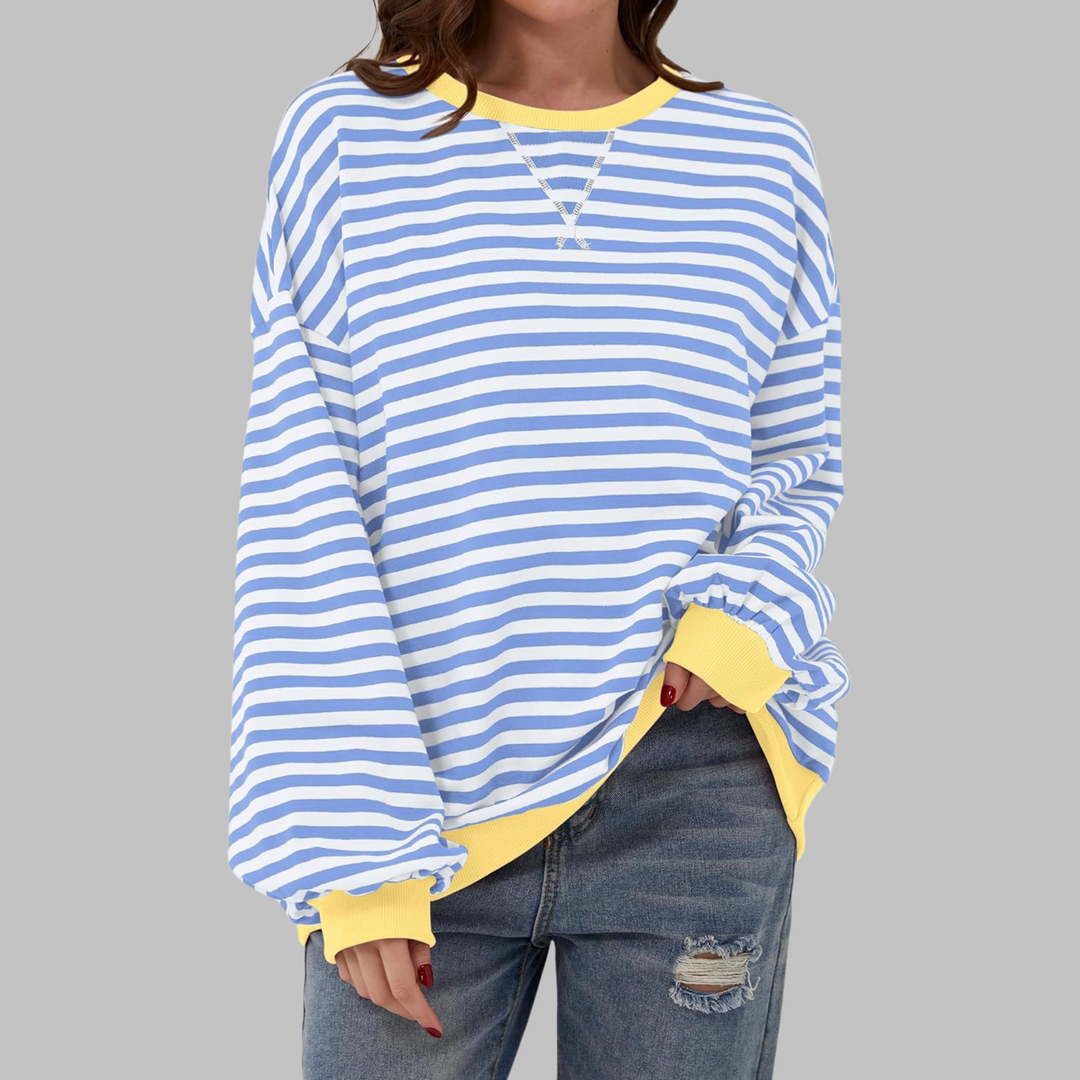 Oversized Damen-Sweatshirt mit blau-weißem Streifenmuster, gelben Bündchen, Rundhalsausschnitt und lässiger Passform.