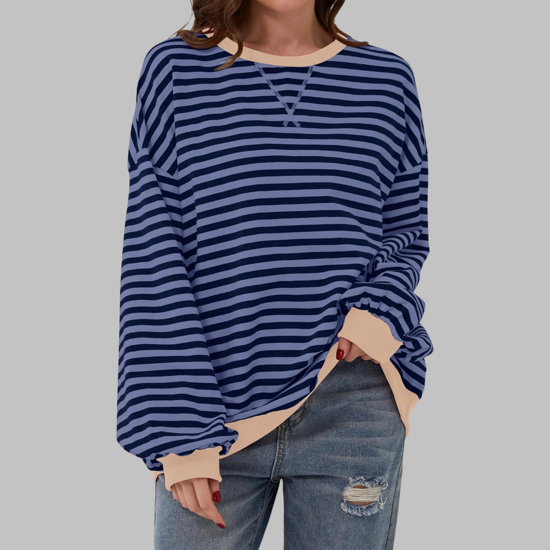 Blau gestreiftes Oversized-Sweatshirt mit Rundhalsausschnitt und beigen Bündchen für einen lässigen Look.