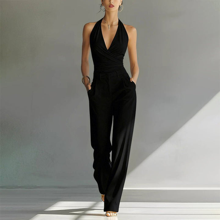 Schwarzer Mia Damen Neckholder Jumpsuit mit Wickeloptik und weitem Bein