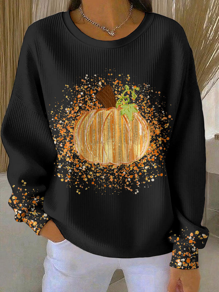 Schwarzes Damen-Sweatshirt mit gerippter Textur, Rundhals und buntem Kürbis-Print auf Vorderseite und Ärmeln.
