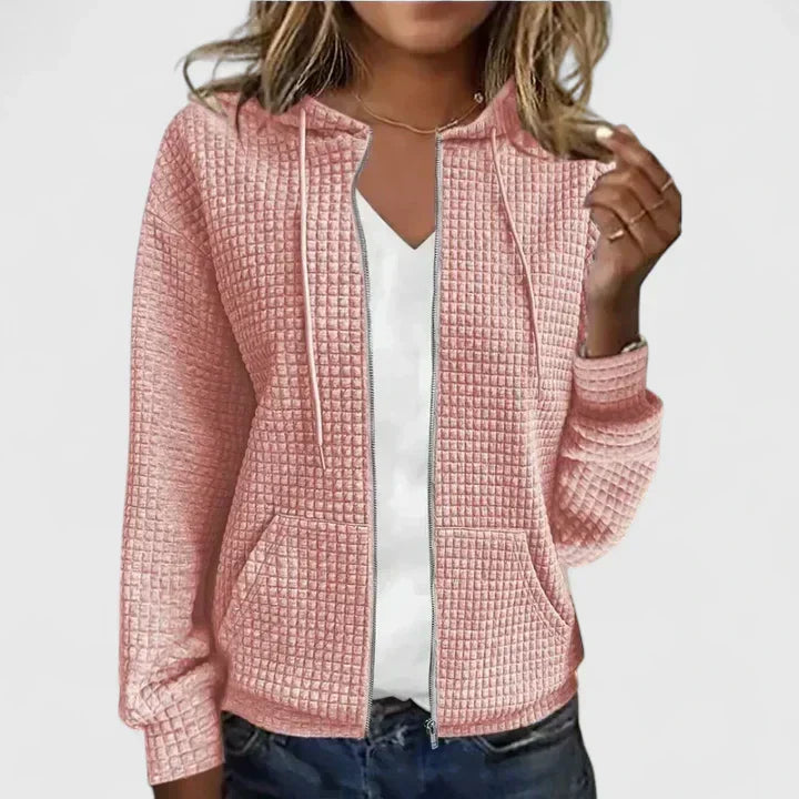 Rosa Damen-Steppjacke mit Waffel-Optik, Kapuze, Kordelzug und durchgehendem Reißverschluss.