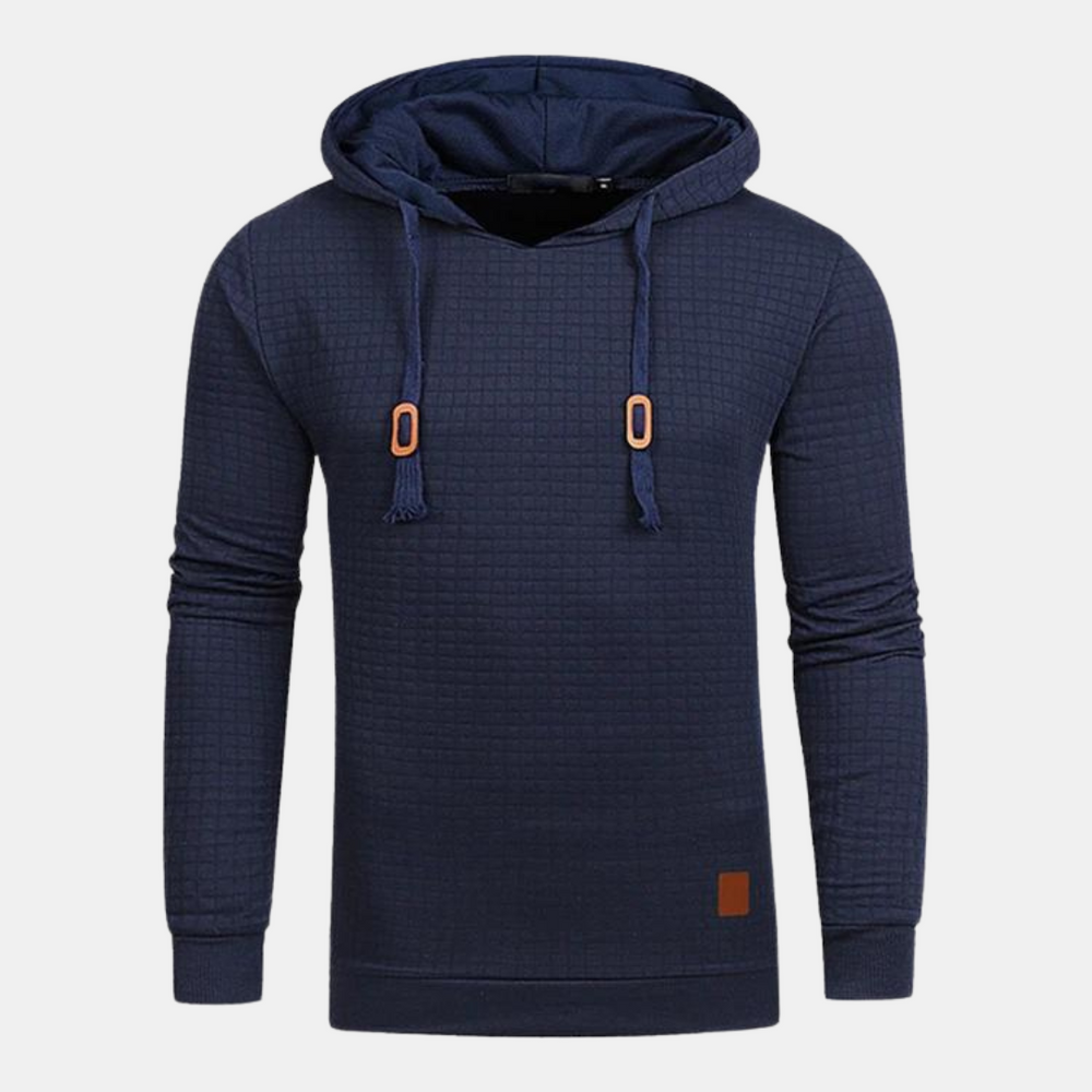 Dunkelblauer Herren-Kapuzenpullover mit strukturiertem Karomuster, Kapuze mit Kordelzug und braunen Leder-Details.