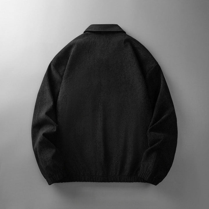 Schwarze Herren-Cordjacke mit Umlegekragen und elastischem Saum in gerader Passform, Rückansicht.