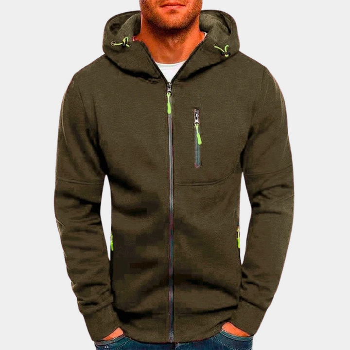 Dunkelgrüne Herren-Sweatjacke mit Kapuze, Reißverschluss und auffälligen neongrünen Zipper-Details an Brust und Taschen.