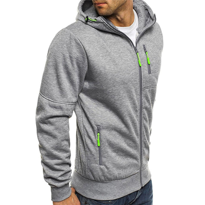 Graue Herren-Sweatjacke mit Kapuze, Reißverschluss und markanten neongrünen Zipper-Details an Brust- und Seitentaschen.