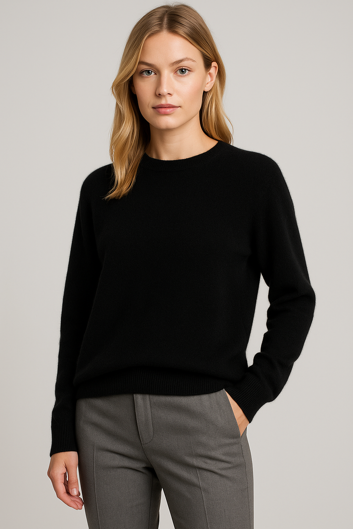 Schwarzer Damen-Kaschmirpullover mit klassischem Rundhals und gerippten Bündchen für einen eleganten, schlichten Look.