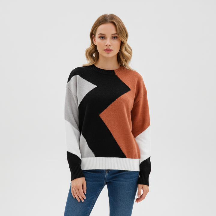 Moderner Sara Damen-Strickpullover mit grafischem Colourblock-Muster in Schwarz, Rostrot, Grau und Weiß.