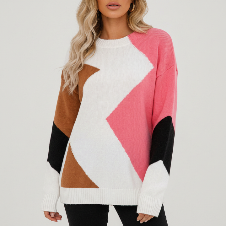 Moderner Damen-Strickpullover mit Colourblock-Muster in Weiß, Rosa, Braun und Schwarz, Rundhalsausschnitt und weicher Struktur.