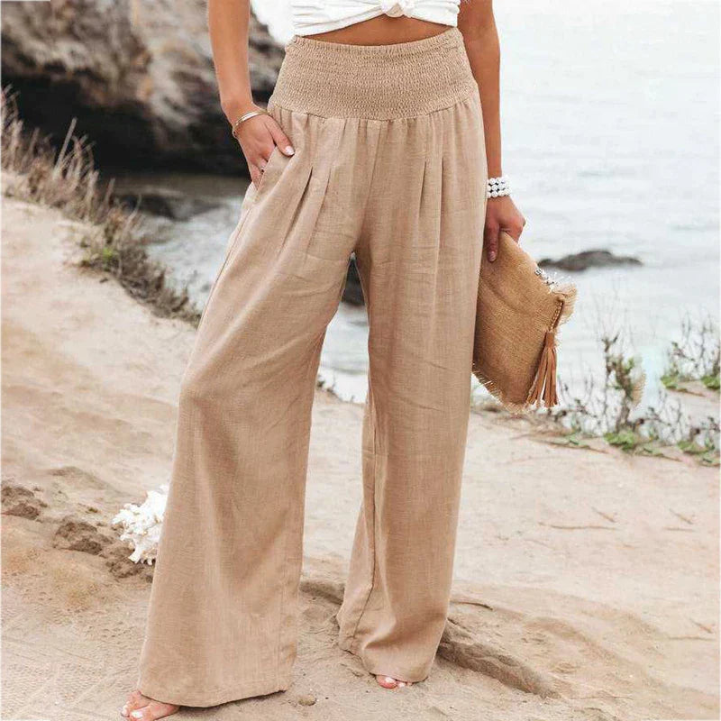 Damen Sara Leinen Sommerhose in Beige mit weitem Bein, elastischem Bund und Taschen, perfekt für entspannte Looks.