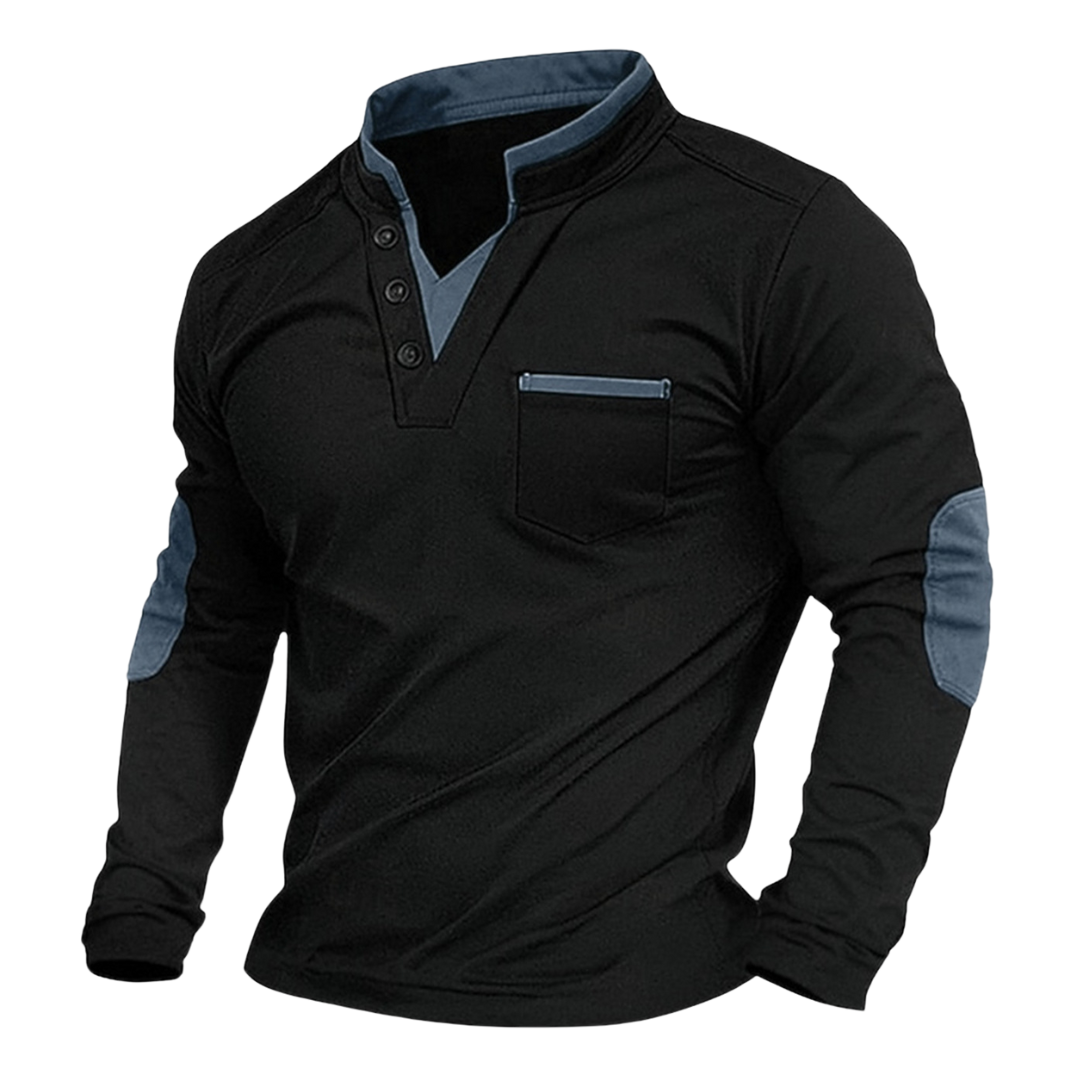Schwarzes Langarm-Shirt mit Stehkragen, Knopfleiste, Brusttasche und grauen Kontrastakzenten an Kragen und Ellbogen.