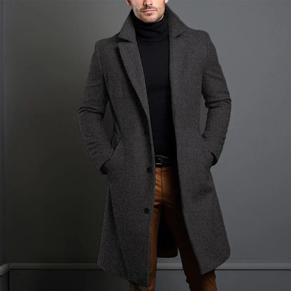 Eleganter, dunkelgrauer Herren-Wintermantel mit Reverskragen, knielangem Schnitt und strukturierter Oberfläche.