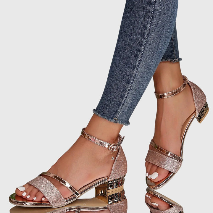 Roségoldene Vivienne Sandalen mit Glitzer-Riemen und verziertem Blockabsatz